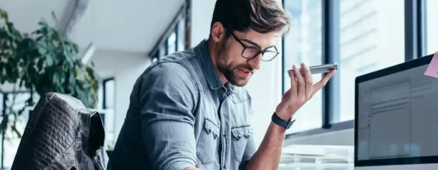 Man working at company, on his phone